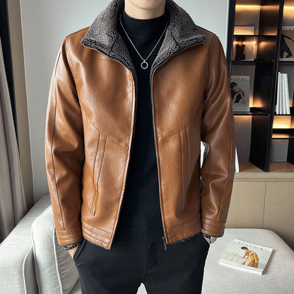 Person wearing a brown leather jacket with a gray interior in a room setting.