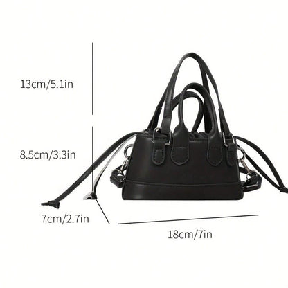 Black handbag with measurements indicated on a white background